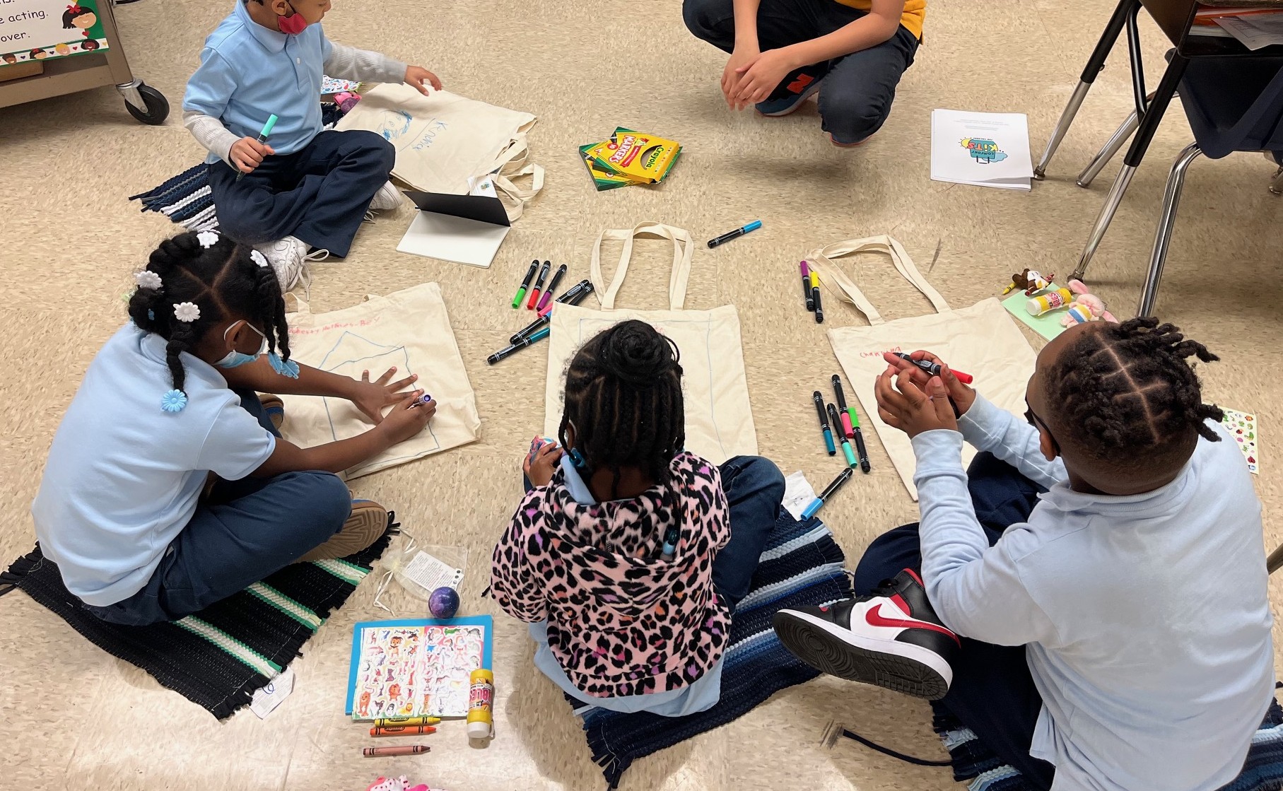 Children receiving Comfort Kits at a Chicago Public Schools event
